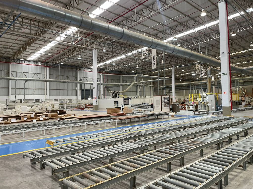 Brazilian furniture factory with automated production lines and wood panels ready for assembly — part of Vista Furniture Co.’s curated network of export-ready manufacturers.